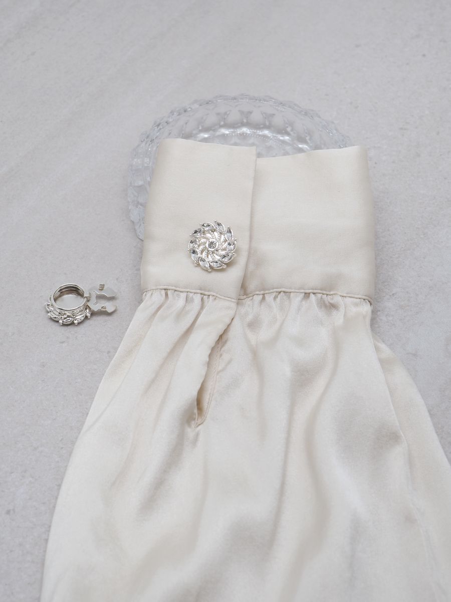 Knappepynt 2stk. spinner sølvfarget