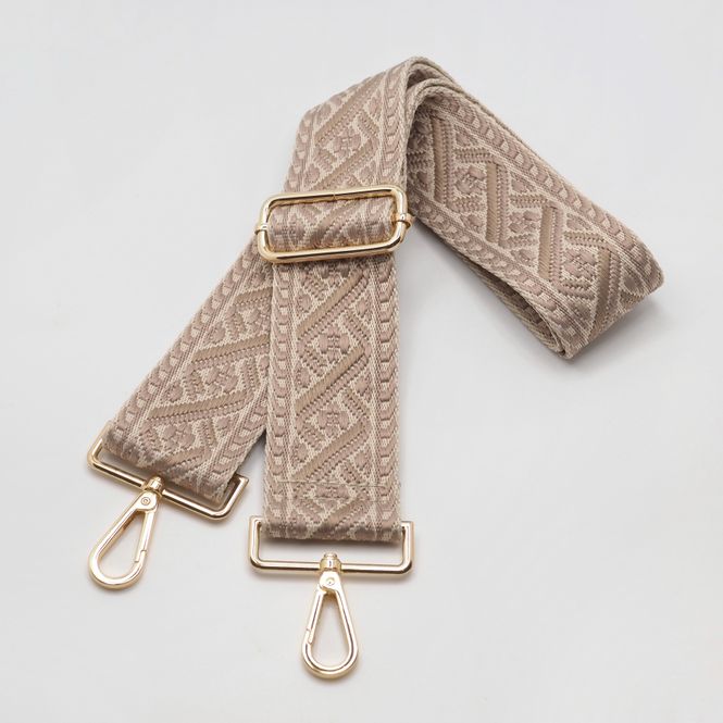 Hovedbilde Veskestropp med geometrisk mønster krem beige