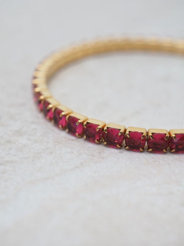 Tennisarmbånd strikk fuksia