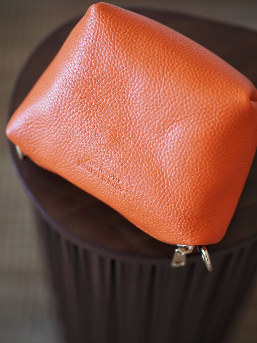 Bøtteveske semsket skinn oransje